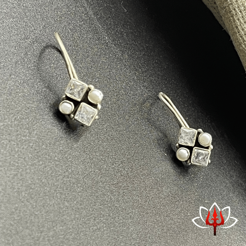 Elegant silver earrings with white stones