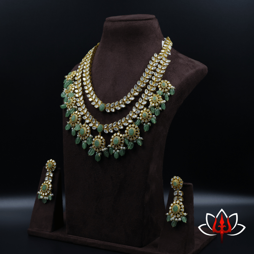 Silver Adorned with Sparkling Stones & Green Gem Drops