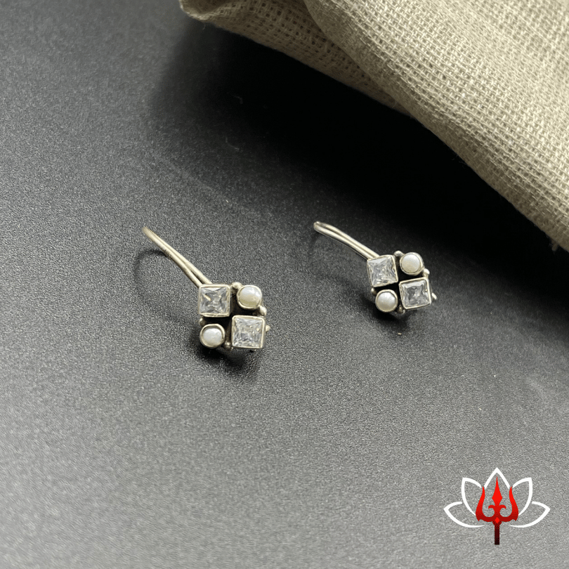 Elegant silver earrings with white stones